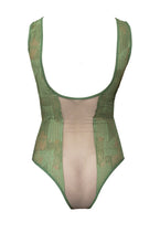 Load image into Gallery viewer, Step into our newest, coolest bodysuit style. Made with our exclusive green geometric lace and sheer tulle front and back panels, this maillot has a low scoop back and a Brazilian back cut.  Lined in 100% cotton.
